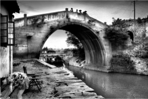 #124-022 The Maple Bridge of Suzhou was made famous during the Tang Dynasty when poet Zhang Ji (766-830 CE) wrote about it after his boat anchored there for the night. Travel in old China was mainly by boat, especially in the south, which is crisscrossed by miles of waterways.